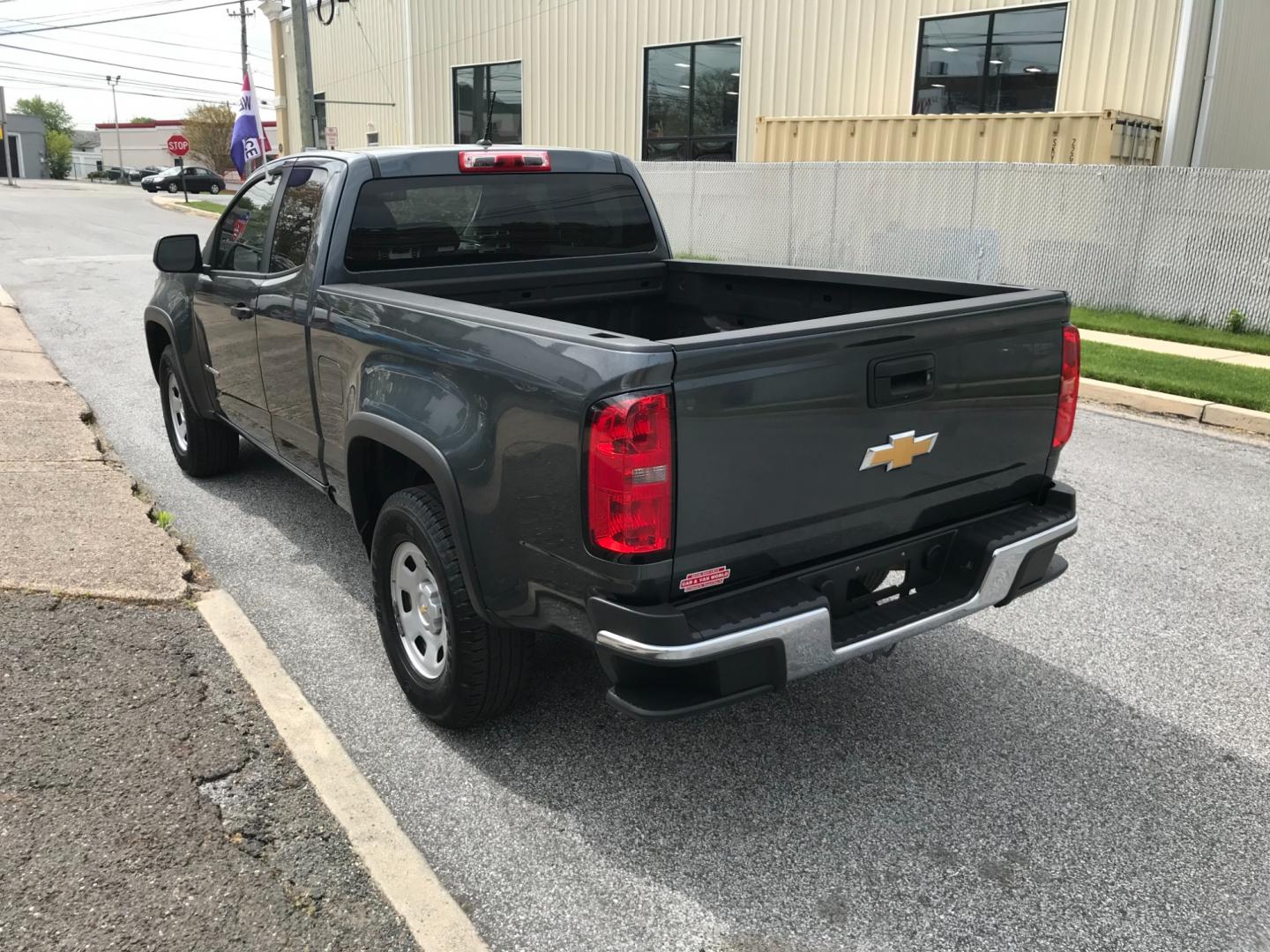 2015 Green /Gray Chevrolet Colorado Work Truck (1GCHSAEA4F1) with an 2.5 V4 engine, Automatic transmission, located at 577 Chester Pike, Prospect Park, PA, 19076, (610) 237-1015, 39.886154, -75.302338 - 2015 Chevrolet Colorado: Extended Cab (3-Door), remote start, backup camera, new PA inspection, runs LIKE NEW! This vehicle comes inspected and has been given a bumper to bumper safety check. It is very clean, reliable, and well maintained. We offer a unique pay plan that is known for being the e - Photo#5